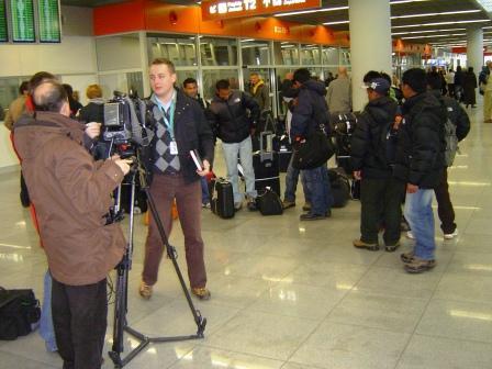 Nepali workers being interviewed by TV reporters in Poland